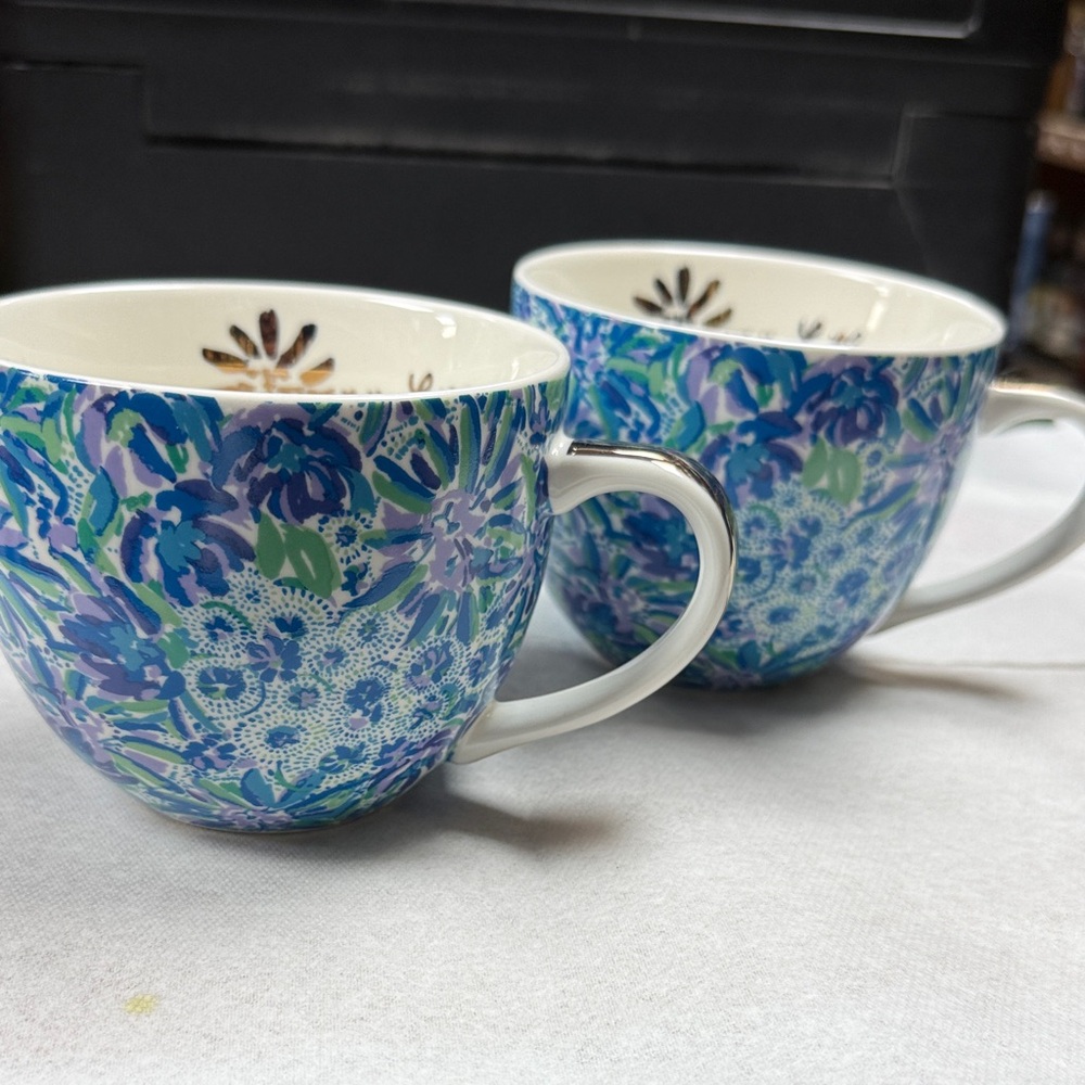 Lilly Pulitzer coffee cups. Blue floral “Lion Around pattern Set of two
